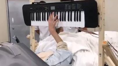 Taira dystonia patient in Japan piano